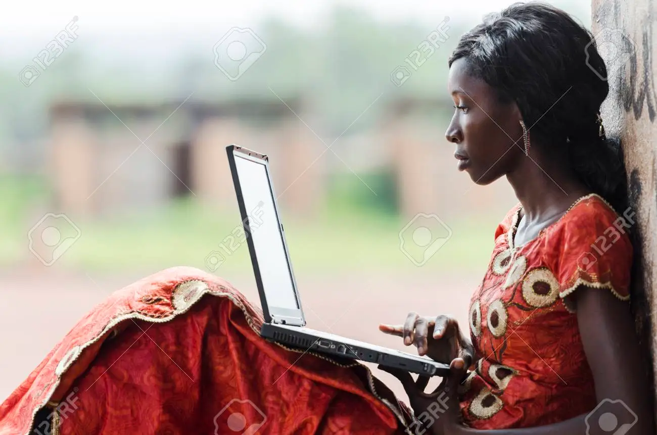 Young African woman using a laptop for digital learning